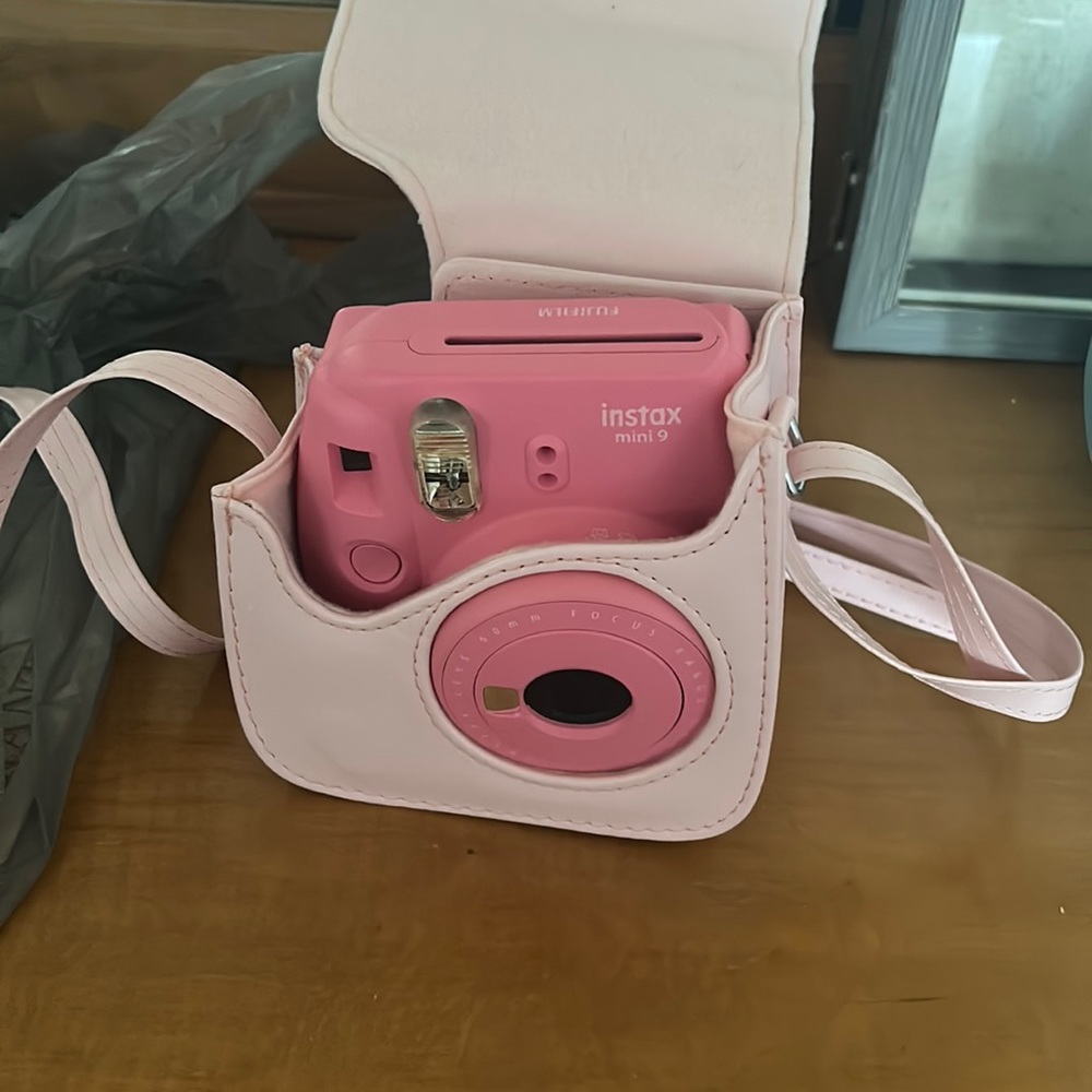 Instax camera comes with case and film